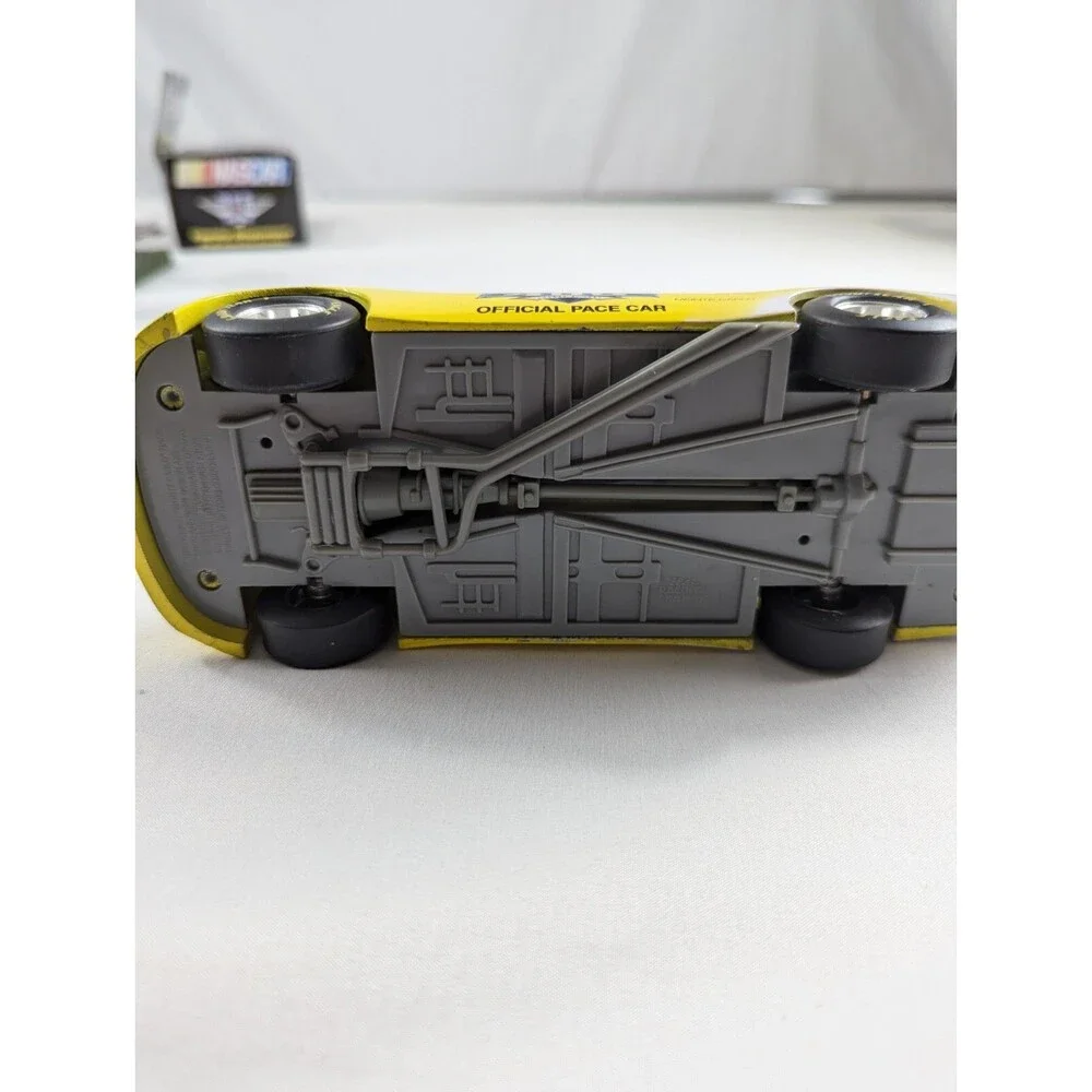 1996 Racing Champions Chevrolet BriCkyard 400 1:64 Monte Carlo Car Yellow